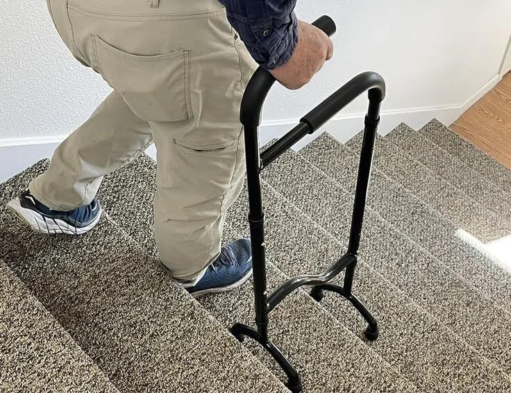 Person using a stair walker on carpeted stairs