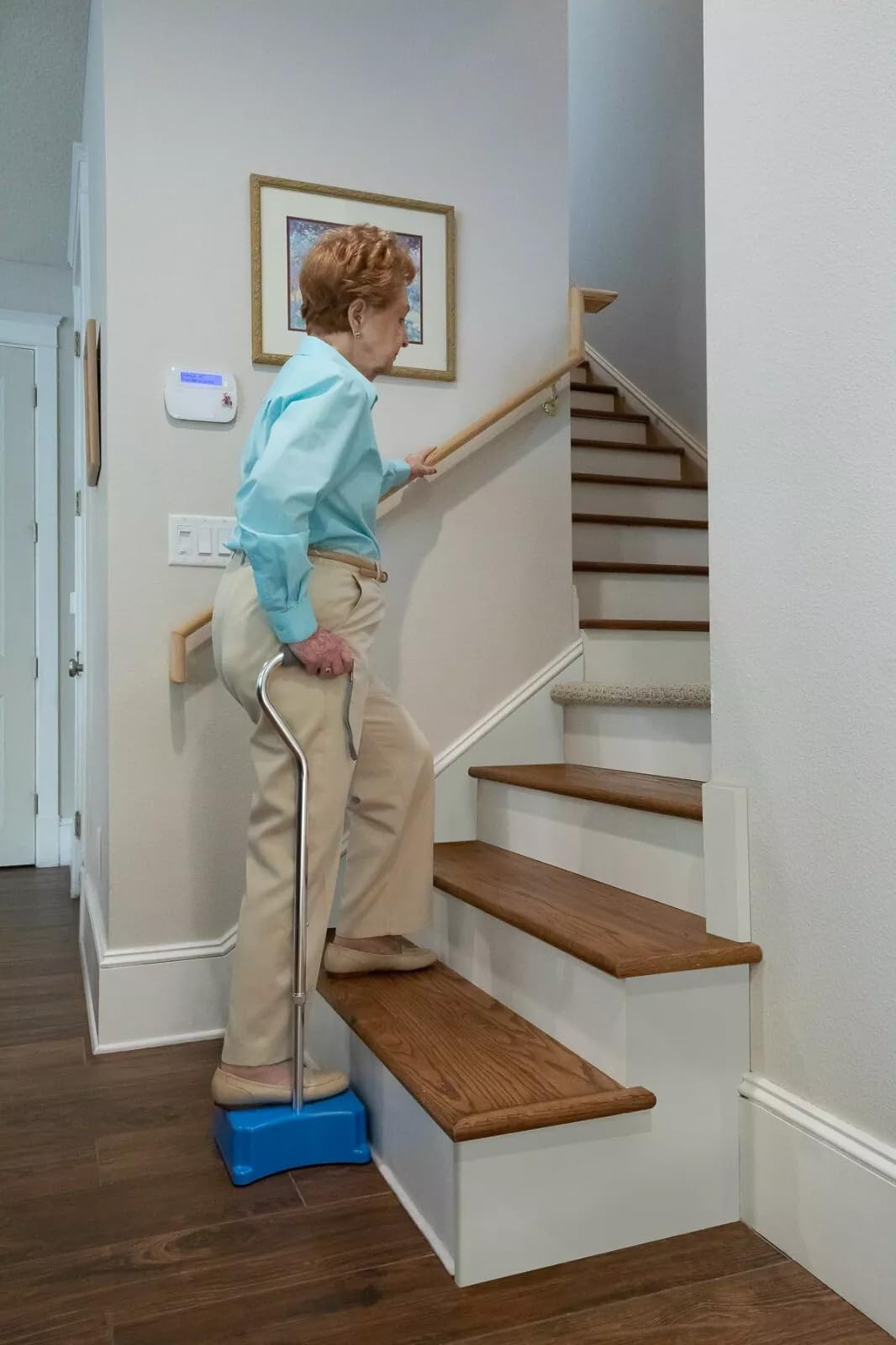 Safe walker stair method using a handrail
